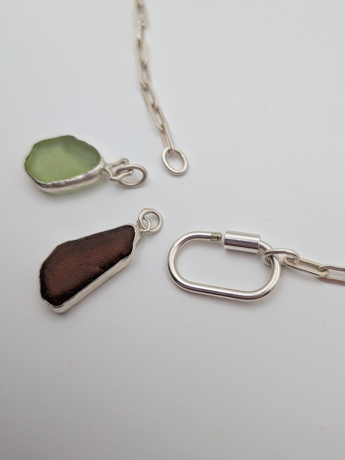 Chunky sterling silver paperclip chain with an oversized carabiner clasp by All Our Light.