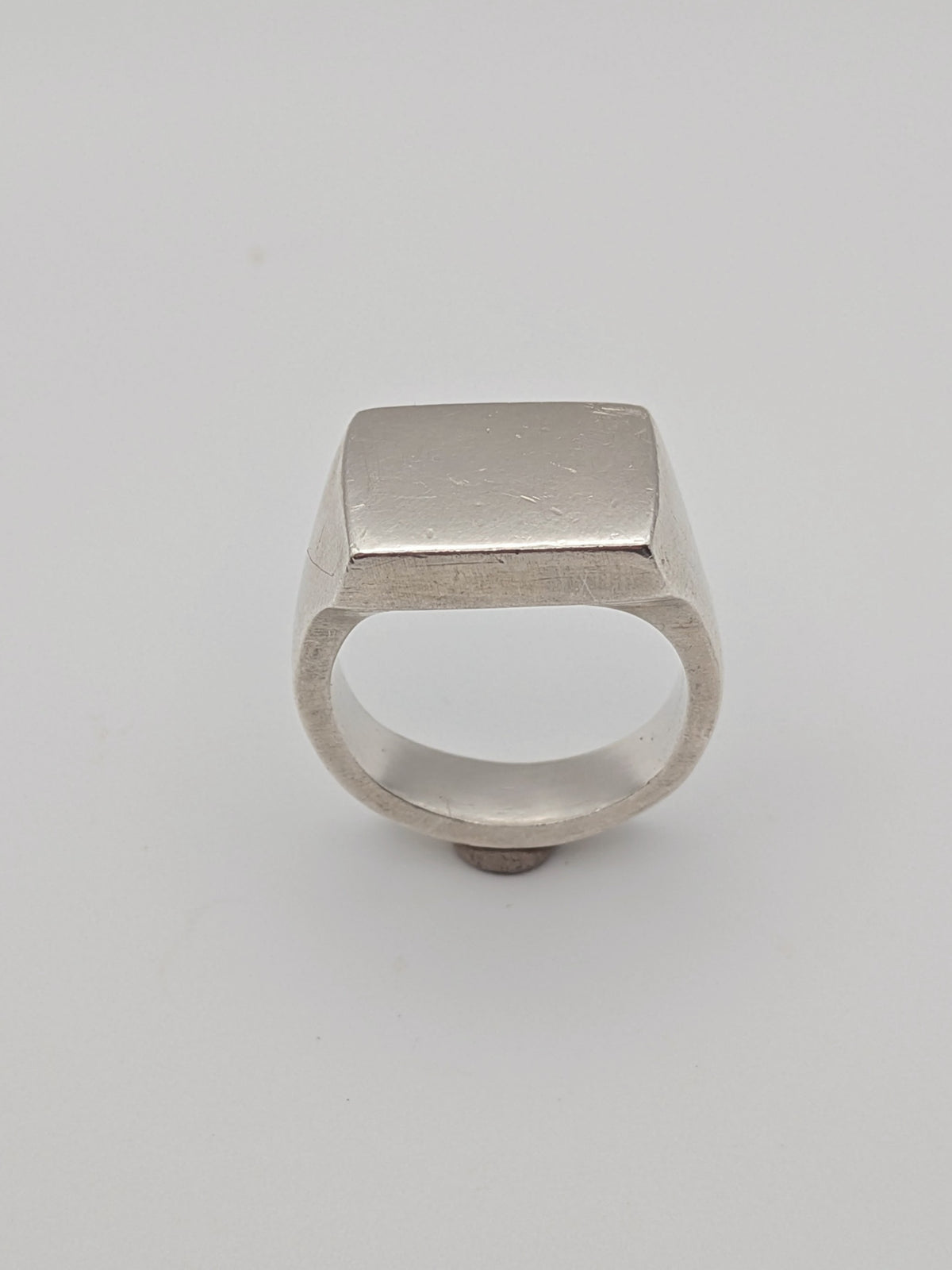 Handmade chunky square sterling silver signet ring by All Our Light.