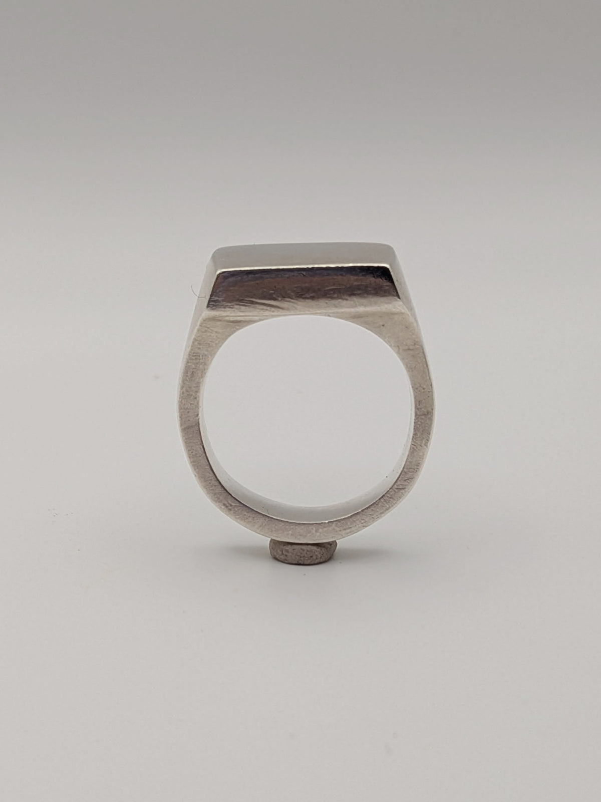 Handmade chunky square sterling silver signet ring by All Our Light.