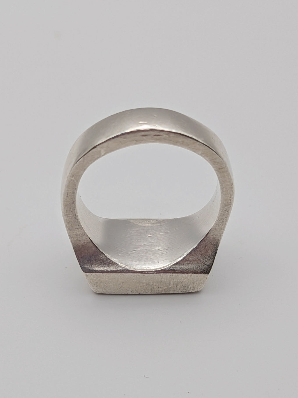 Handmade chunky square sterling silver signet ring by All Our Light.