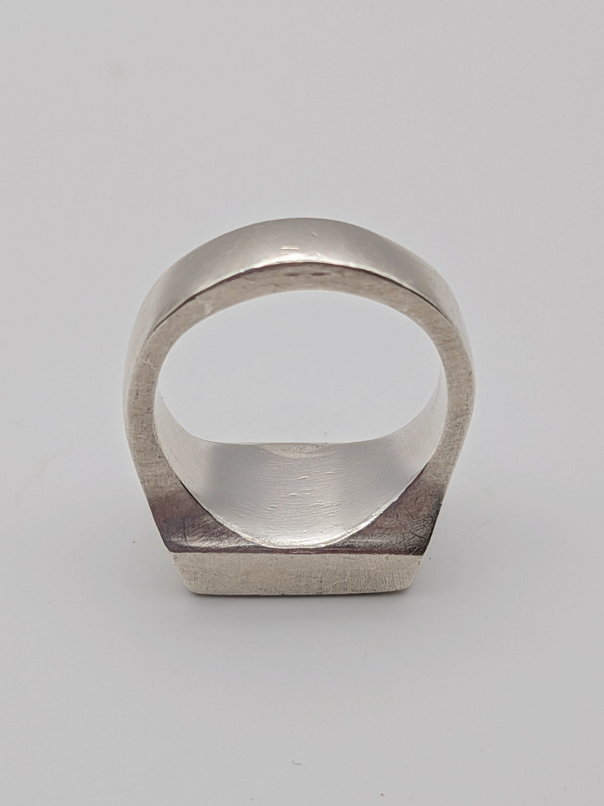 Handmade chunky square sterling silver signet ring by All Our Light.