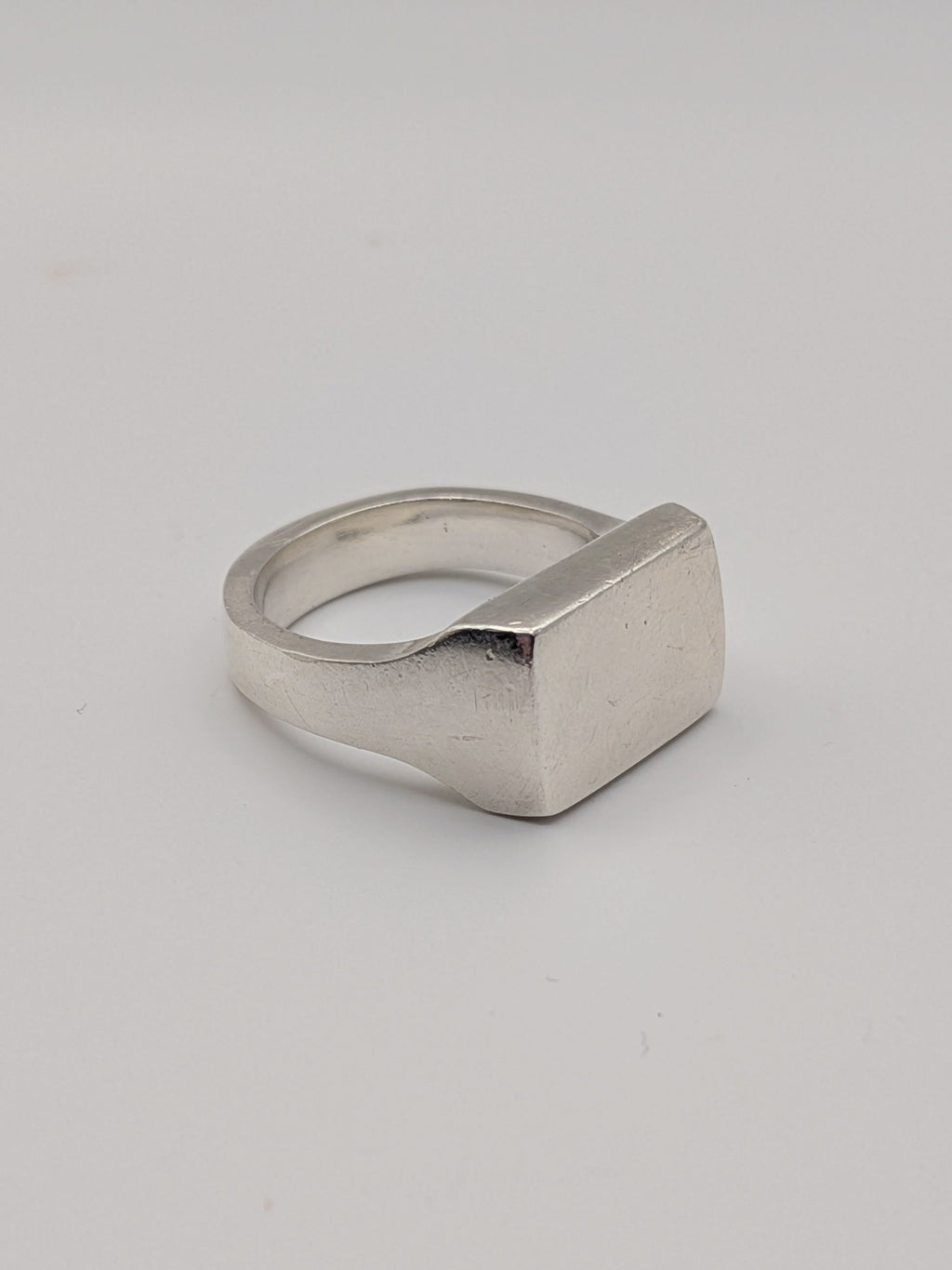 Handmade chunky square sterling silver signet ring by All Our Light.