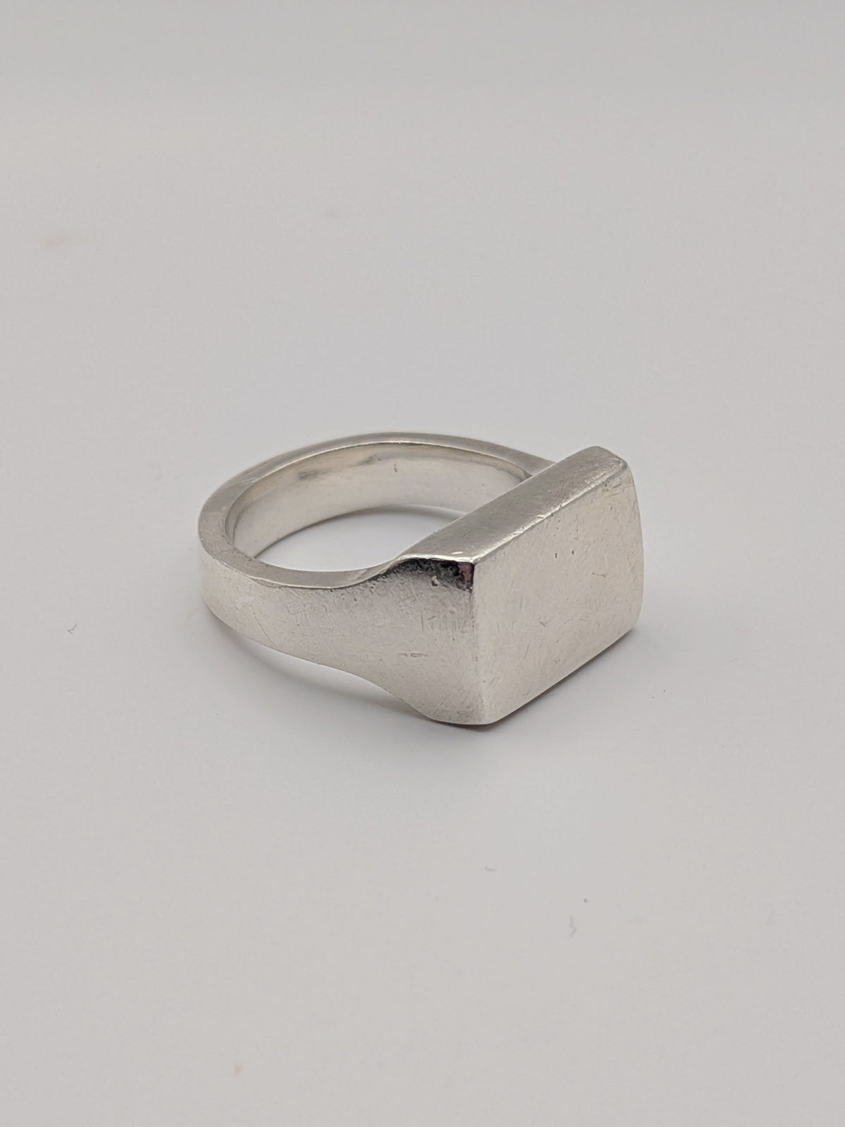 Handmade chunky square sterling silver signet ring by All Our Light.