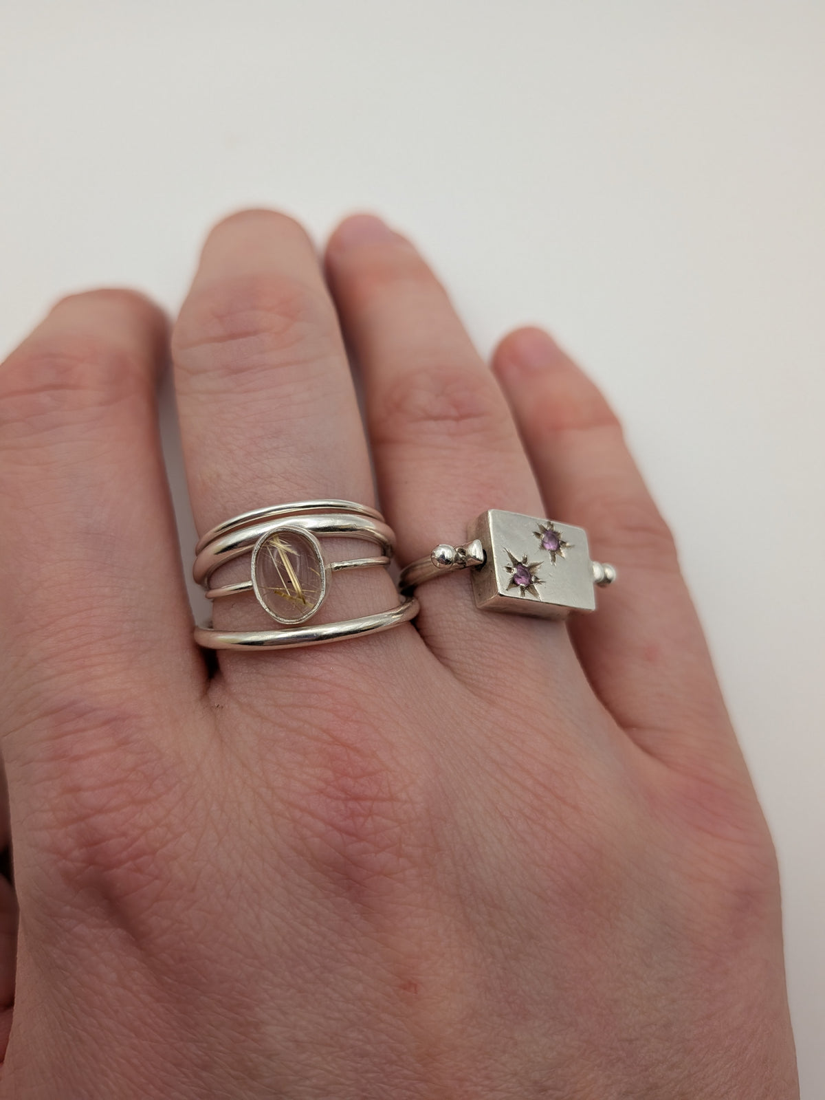 Rutilated quartz gemstone ring in a handmade sterling silver setting by All Our Light.