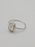 Rutilated quartz gemstone ring in a handmade sterling silver setting by All Our Light.