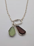 Seafoam green sea glass pendant in a handmade silver setting by All Our Light.