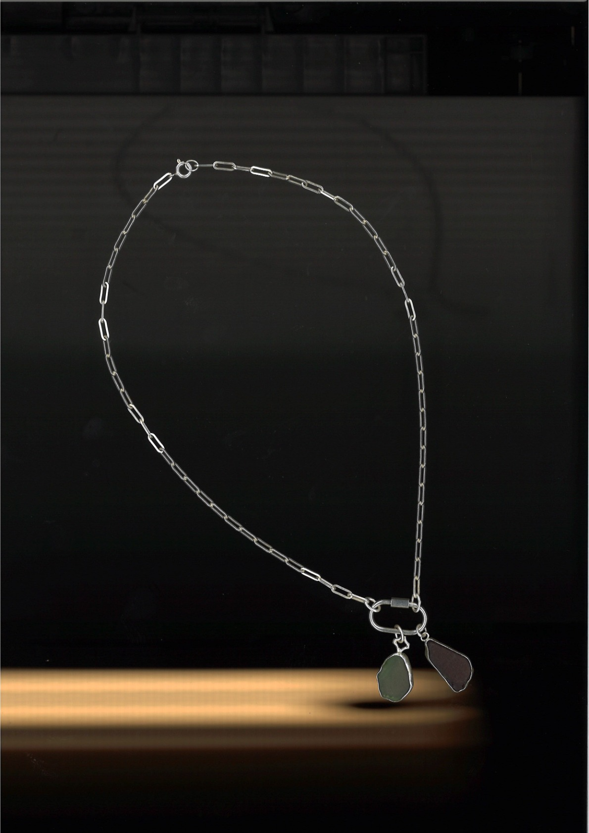 Seafoam green sea glass pendant in a handmade silver setting by All Our Light.