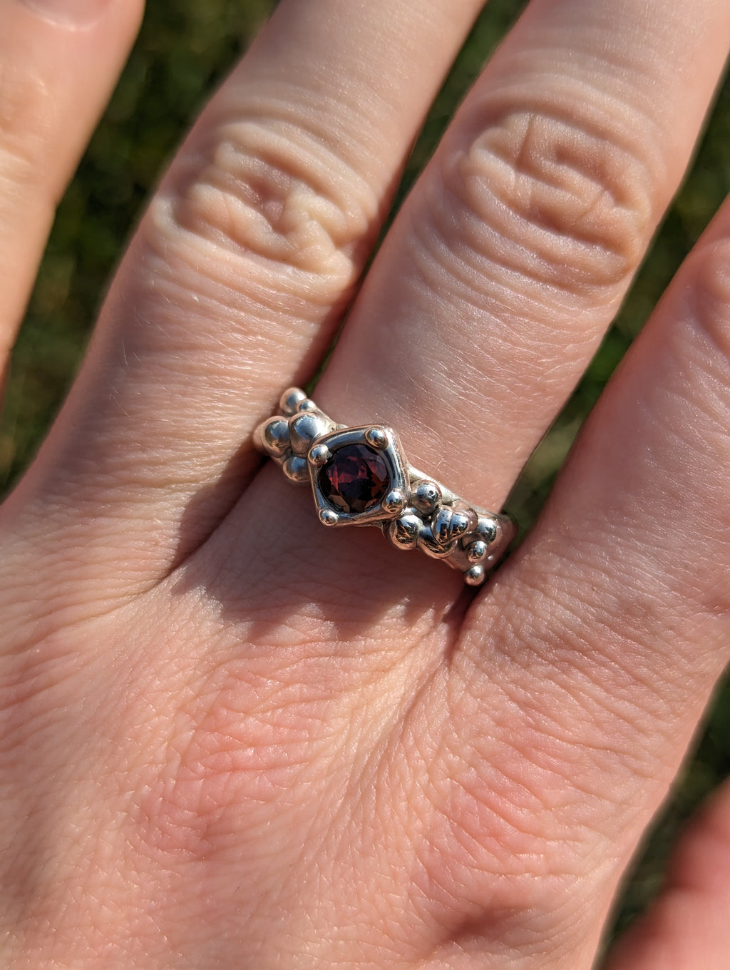 Sterling silver red CZ stone ring