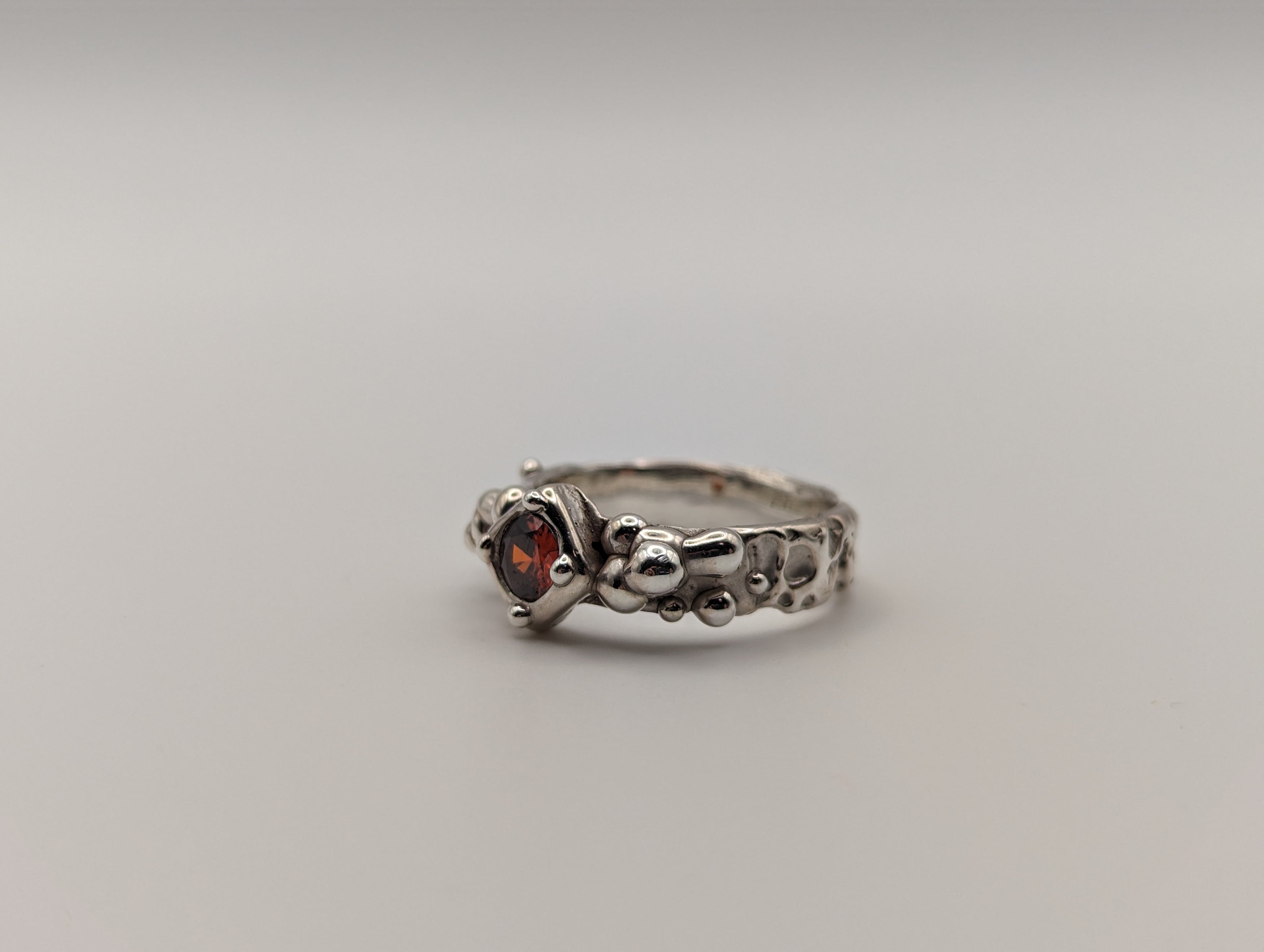 Sterling silver red CZ stone ring