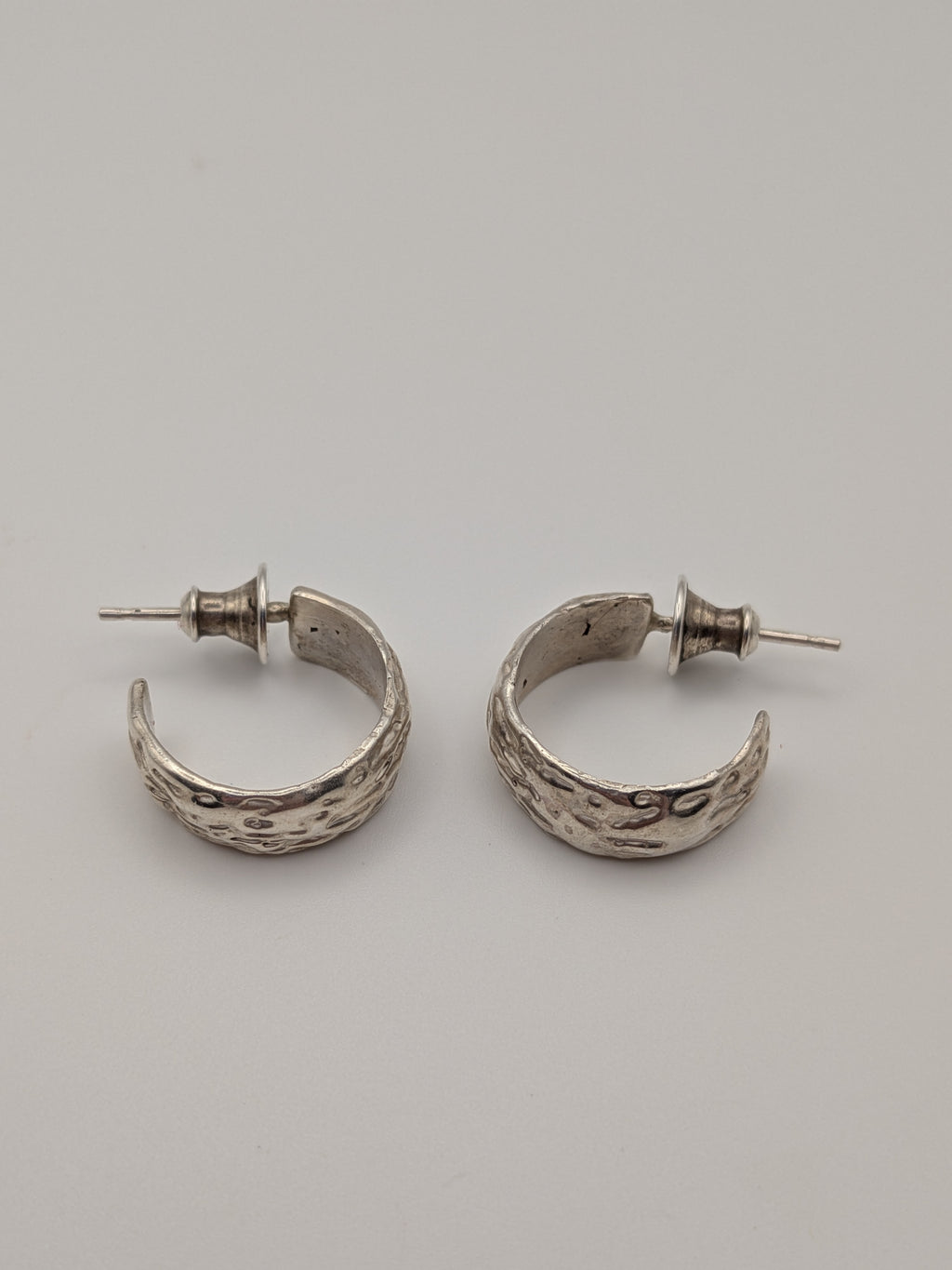 Small textured hoop studs