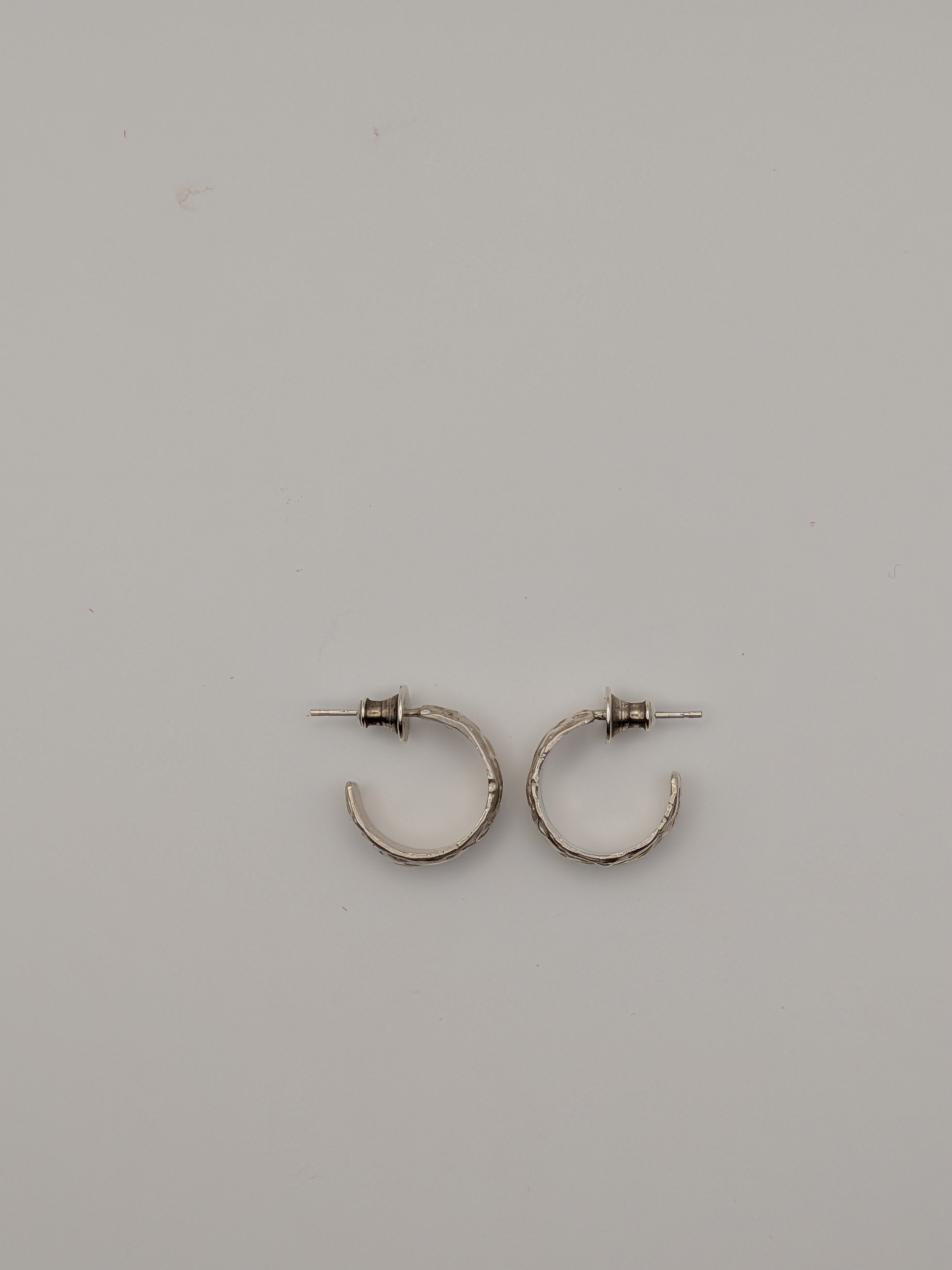 Small textured hoop studs