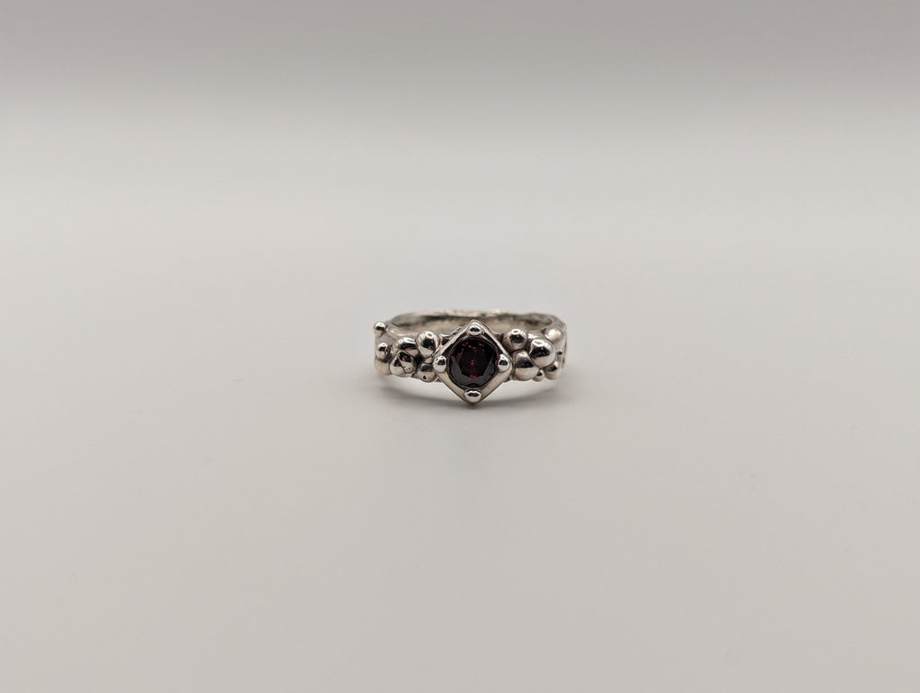 Sterling silver red CZ stone ring