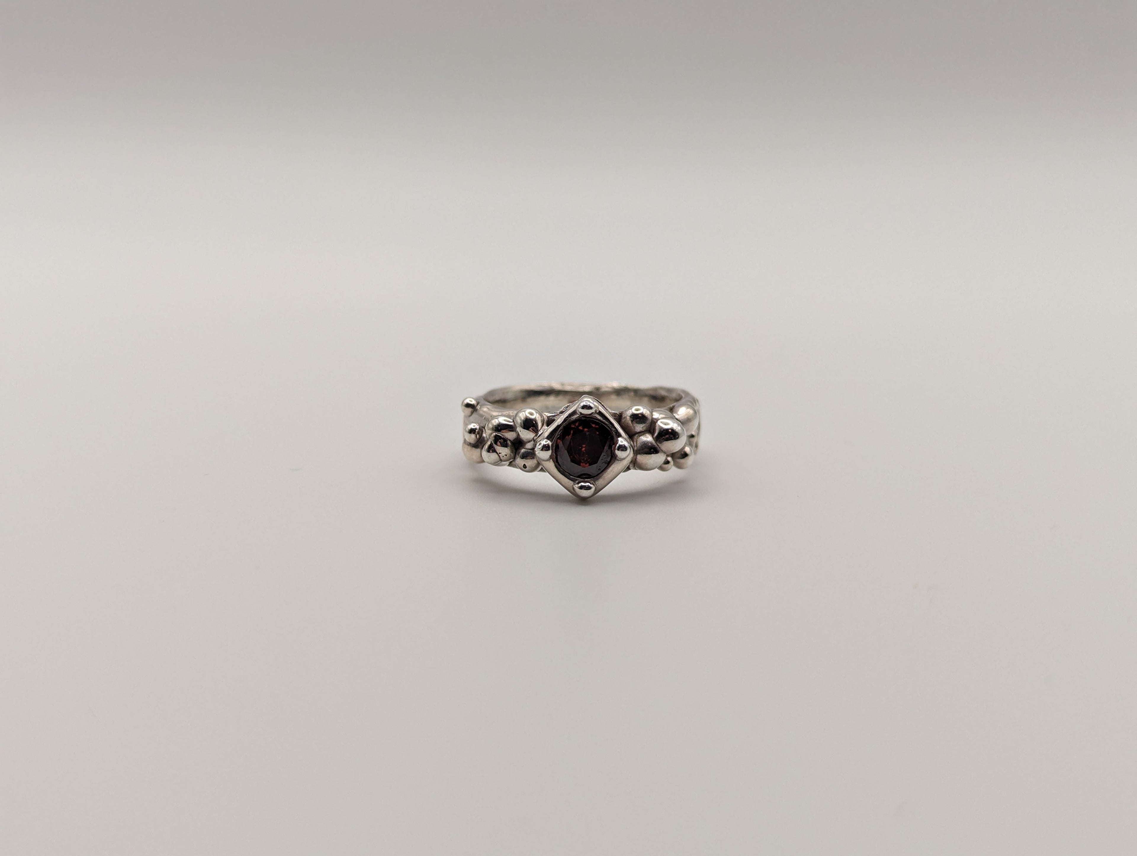 Sterling silver red CZ stone ring