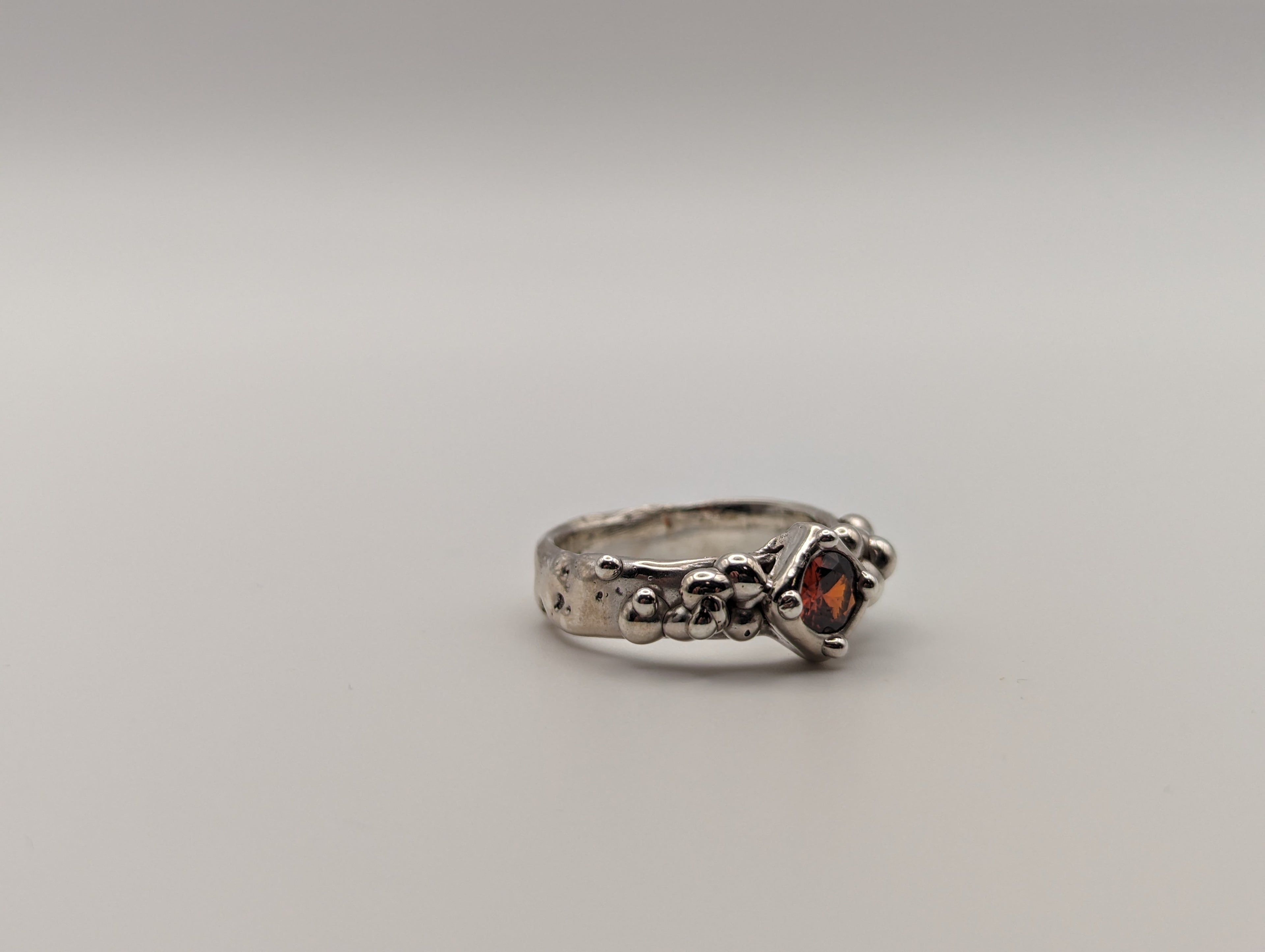 Sterling silver red CZ stone ring